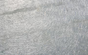 Sourlie laminate fibreglass or shingles?